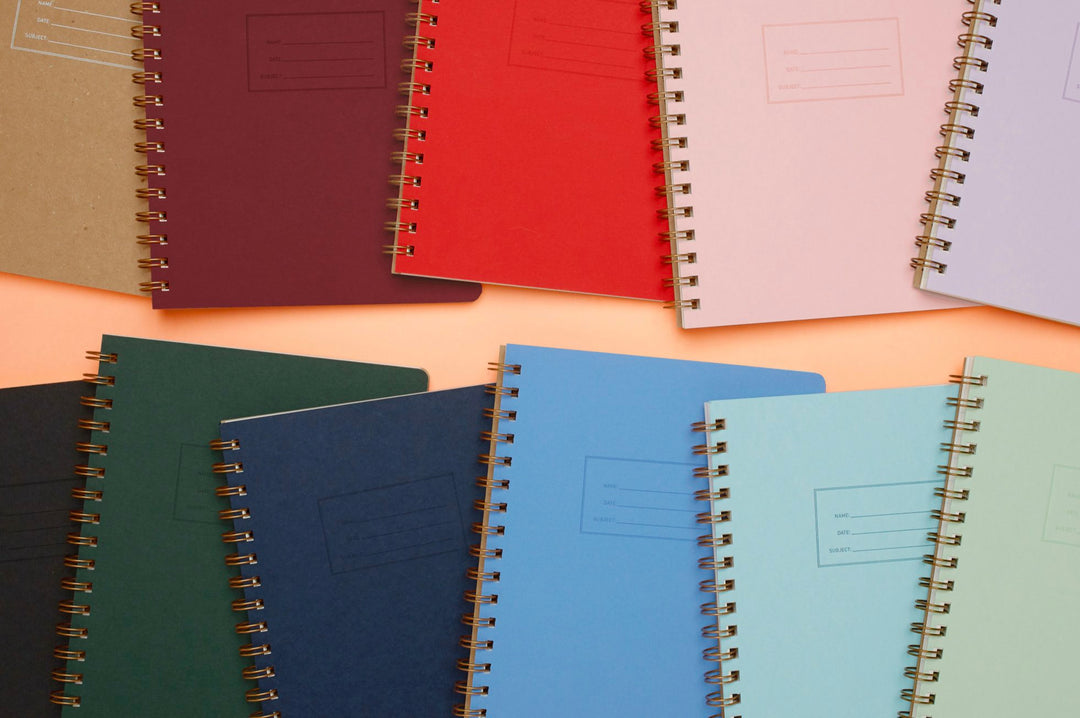 an image of 11 notebooks